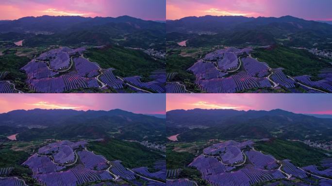 真实霞光中的群山光伏太阳能电池板