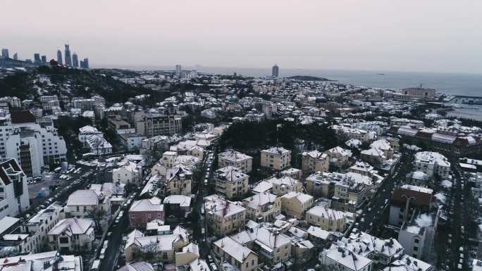 青岛地标老城区雪景下雪航拍4k