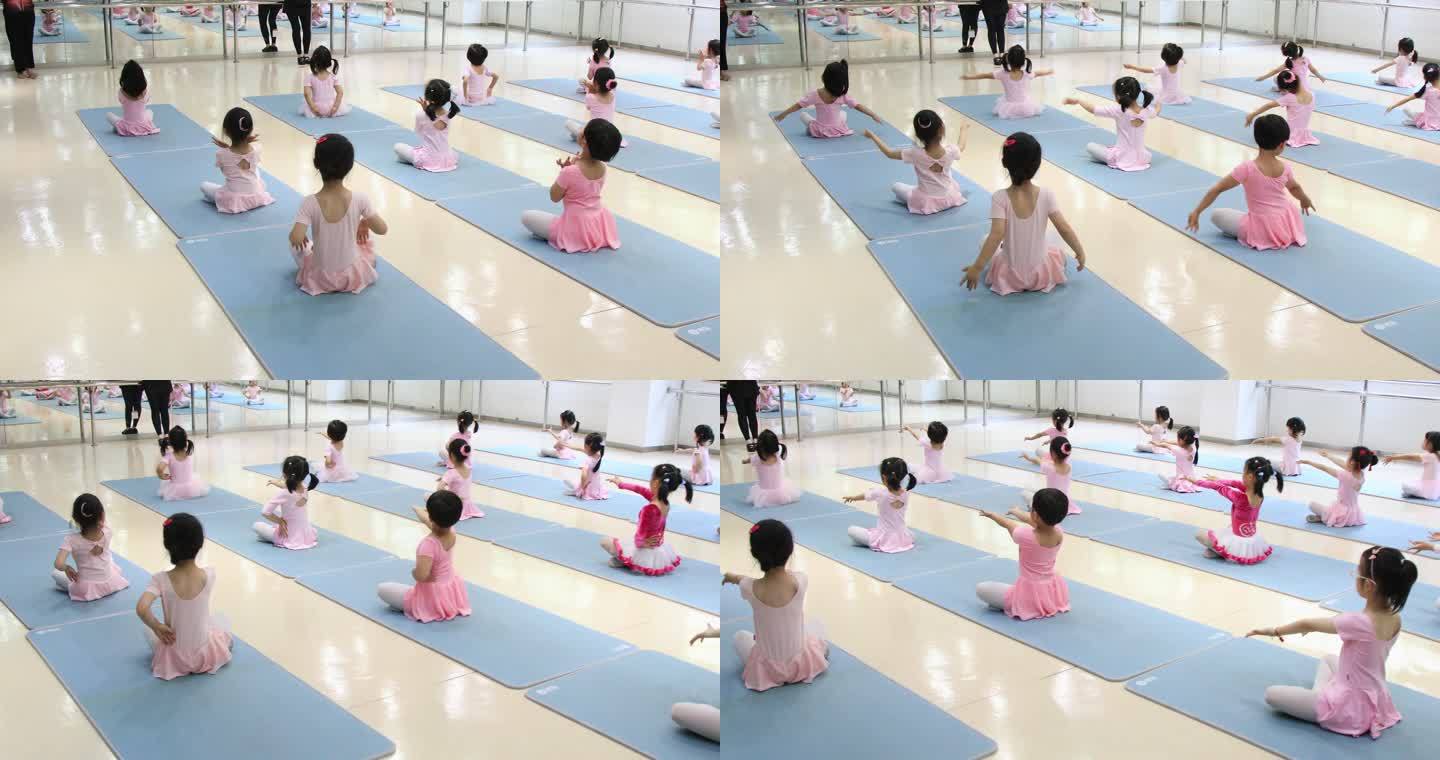 练习舞蹈的小女孩形体训练老师示范
