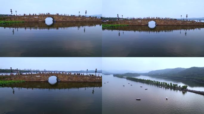 杭州西湖断桥残雪航拍低角度4k