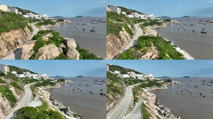 海边公路航拍汽车行驶在沿海公路福建海岸线