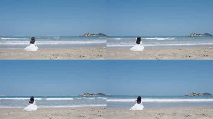 唯美文艺女孩坐在沙滩上看海散心