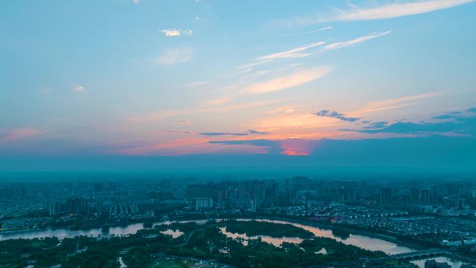 眉山市东坡城区夕阳航拍大范围延时视频