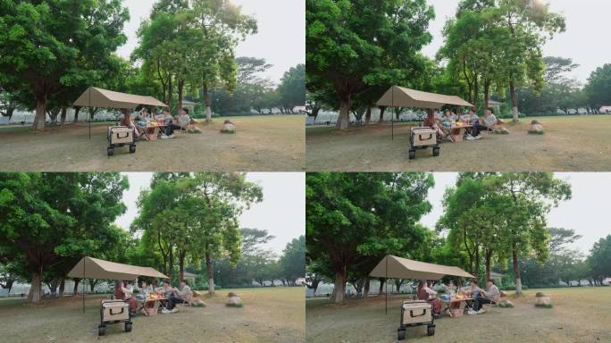 公园草地上扎帐篷露营