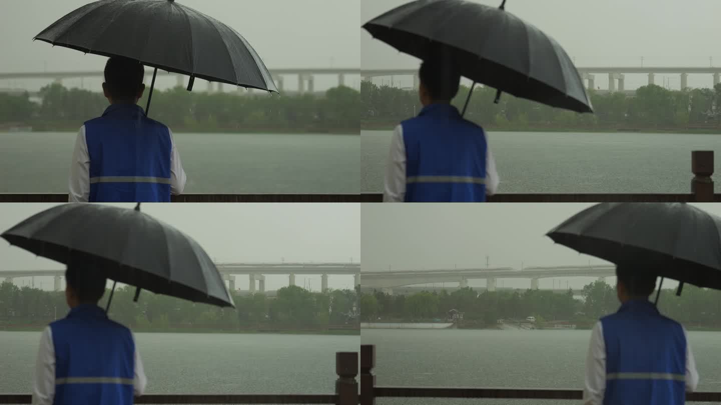 雨中打伞的男人背影