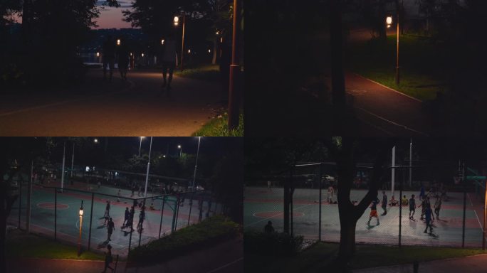 傍晚在公园里散步打球运动的群众