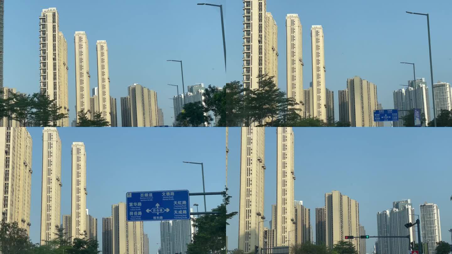 白天驾驶在马路上看窗外建筑环境空镜