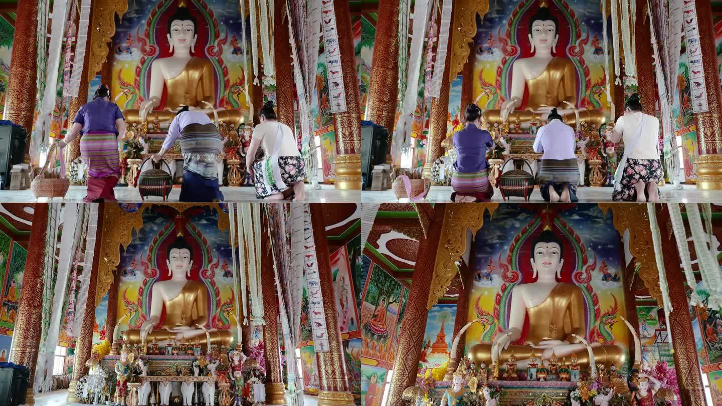傣族百姓在寺庙里跪拜佛像 少数民族宣传片