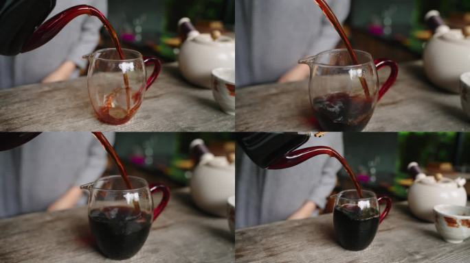 茶艺特写慢镜头玻璃壶出汤倒茶