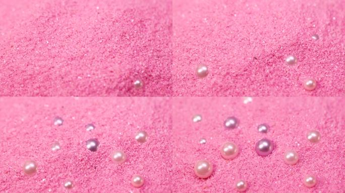 粉色沙子上的珍珠