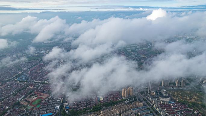 安徽宣城市广德市雨后云海城市航拍延时4K