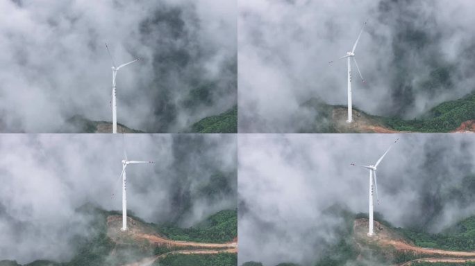 高山上的风力发电风车和山间的云海
