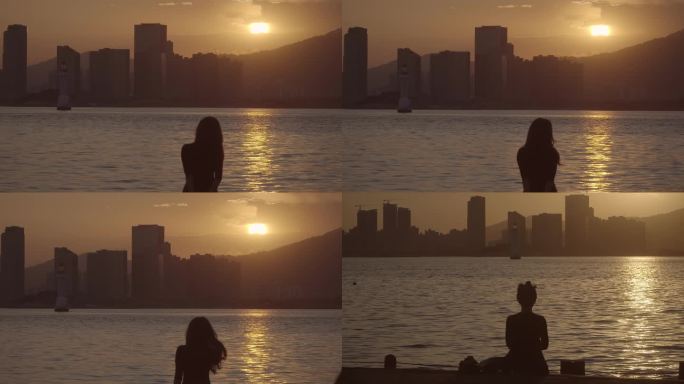 【原创可商用】孤独的女人坐在日落的海边