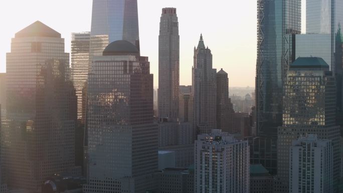 城市航拍纽约日出阳光照射摩天大楼炮台公园