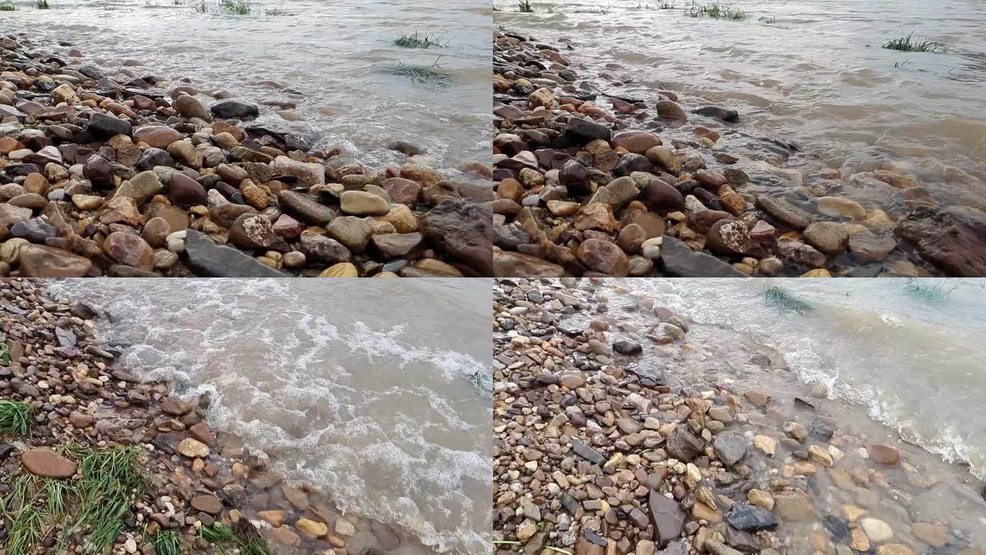 鹅卵石河水河边石块河水洪流洪水河水上涨