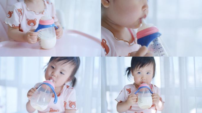 喝奶粉的小宝宝奶粉牛奶奶瓶婴儿