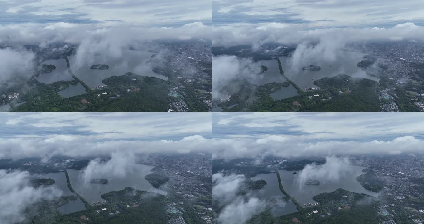 烟雨朦胧云海下的西湖航拍