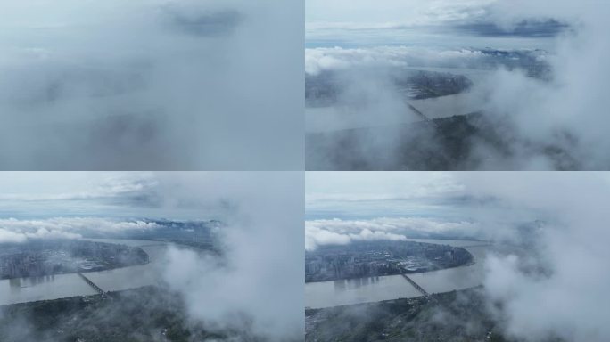 云海下的滨江和钱塘江航拍