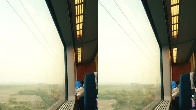 行驶的铁路运输车窗外风景