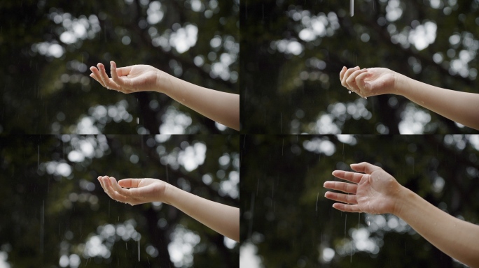 雨天伸手接住雨滴感受雨滴情感情绪素材