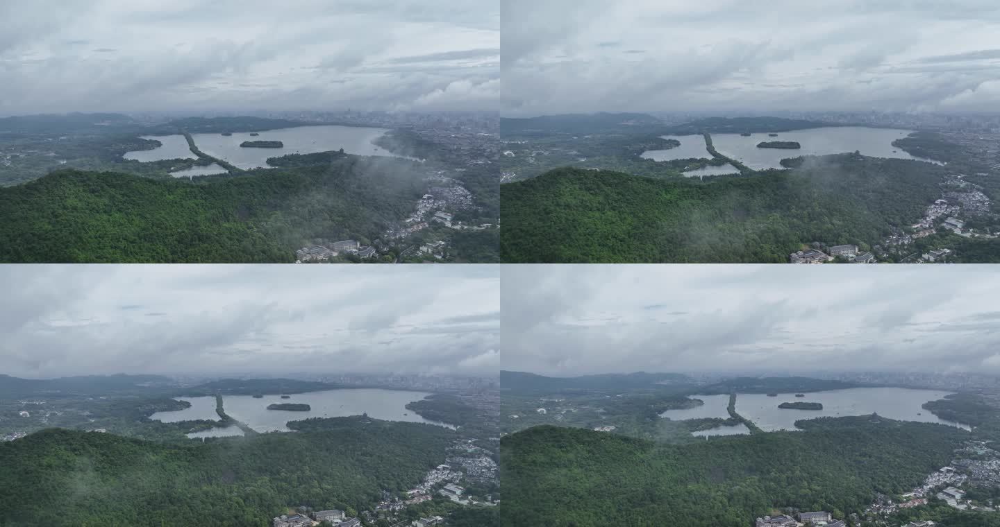 烟雨朦胧云海下的西湖航拍