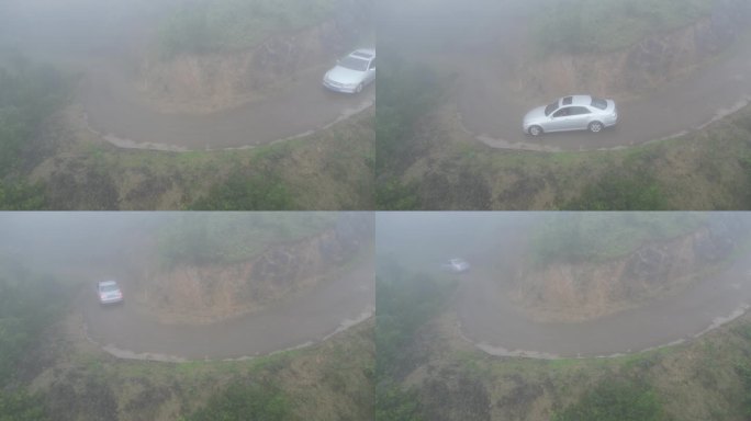 俯瞰林间穿过迷雾的车辆