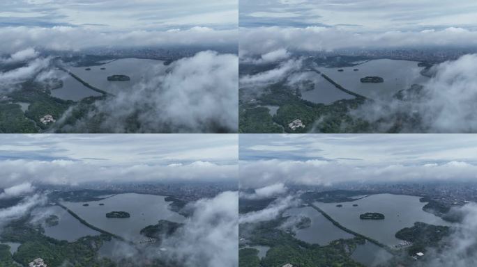 烟雨朦胧云海下的西湖航拍