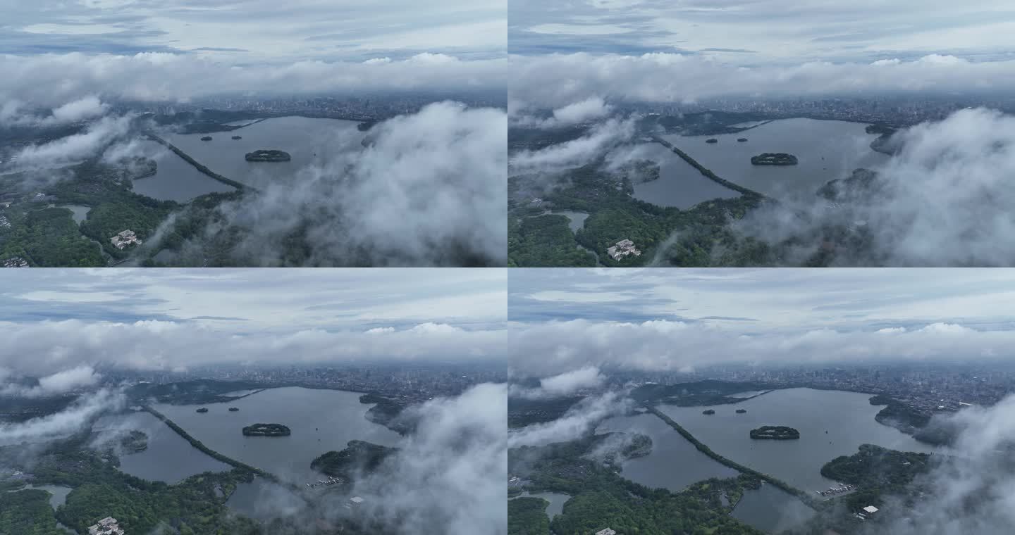 烟雨朦胧云海下的西湖航拍