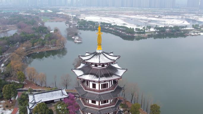 地标湖南长沙洋湖湿地公园白鹭塔雪景航拍