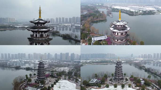 地标湖南长沙洋湖湿地公园白鹭塔雪景航拍