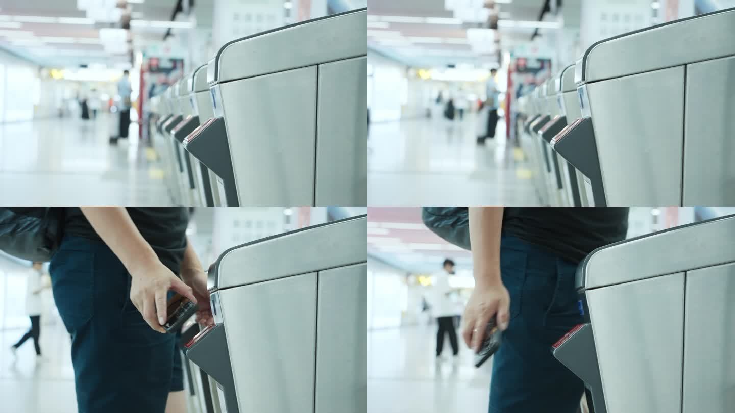 乘客刷手机二维码过地铁站闸机