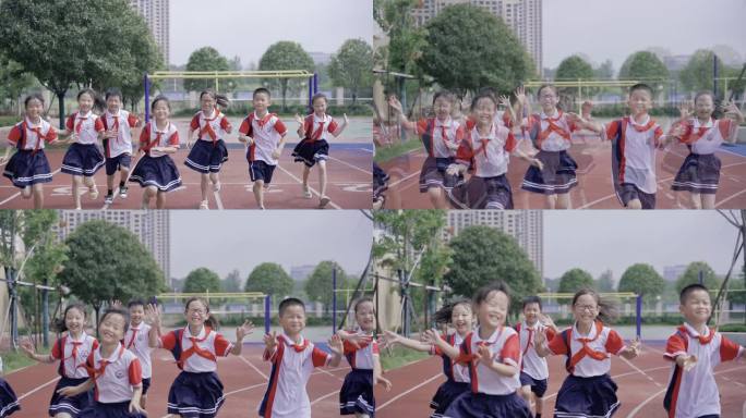小学生操场上笑脸奔跑