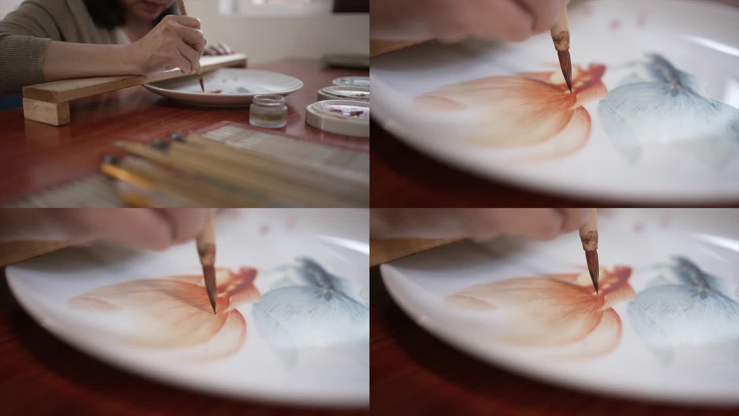 艺术家在瓷器上画鱼