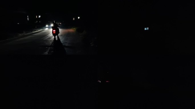 夜晚公路车灯灯光逆光影子骑行行走在公路上