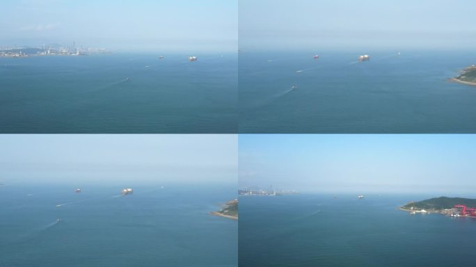 航拍青岛胶州湾海上航行的巨轮
