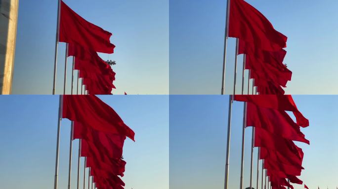 天安门广场人民英雄纪念碑前红旗迎风飘扬