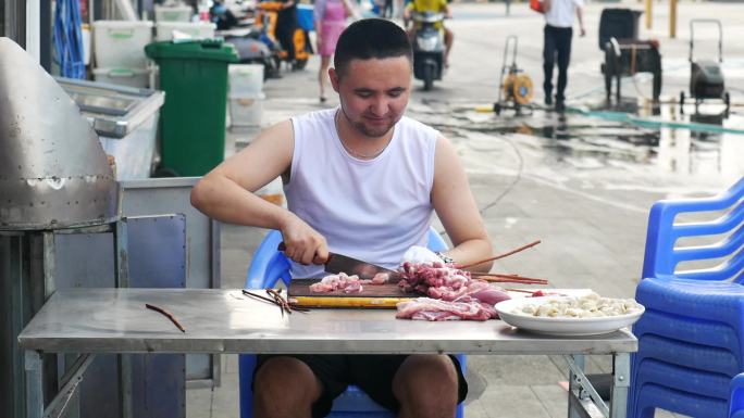 新疆人串羊肉串切羊肉2