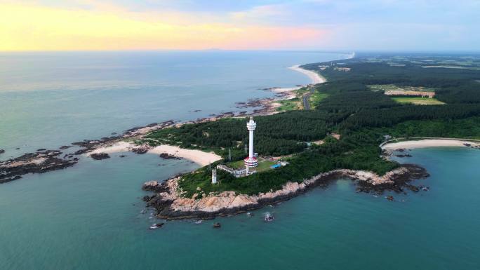 航拍海南省文昌木兰湾航海灯塔日出霞光风景