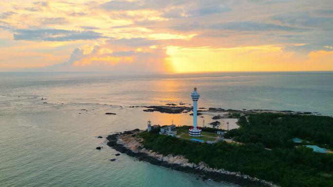 航拍海南省文昌木兰湾航海灯塔日出霞光风景