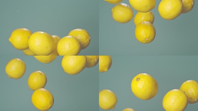 一堆柠檬抛起空中高速特写柠檬黄柠檬