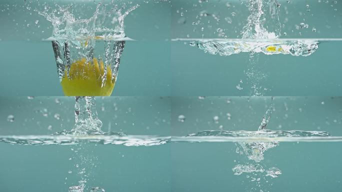 一个柠檬掉入水中特写柠檬黄柠檬