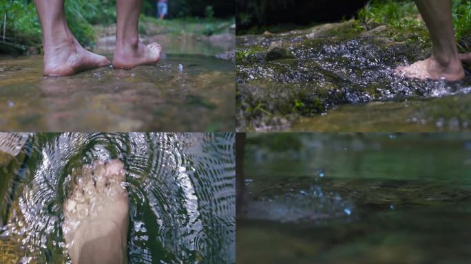 在清澈见底的小溪光脚踩水脚步特写