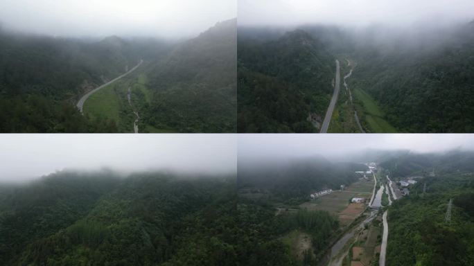 武当山的晨雾和山脚下的村庄道路