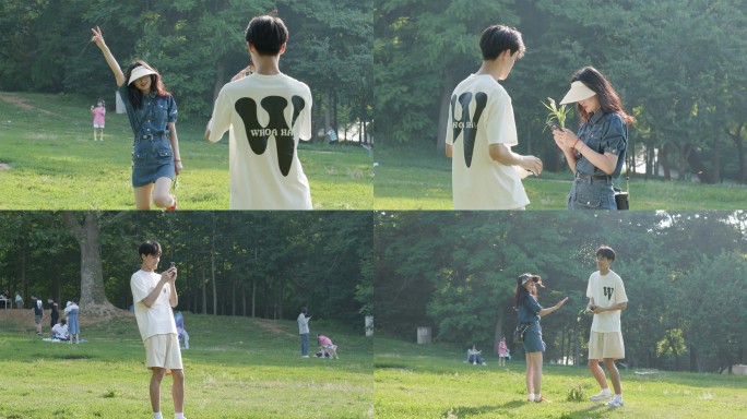 情侣公园草地拍照自拍游玩幸福浪漫情侣视频