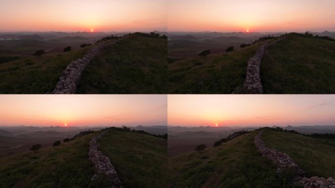 航拍辽宁葫芦岛植股山长城夕阳