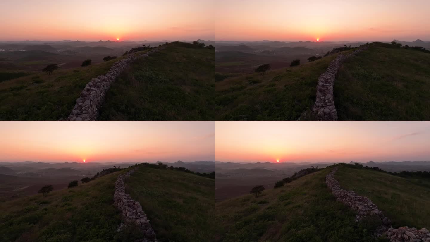 航拍辽宁葫芦岛植股山长城夕阳