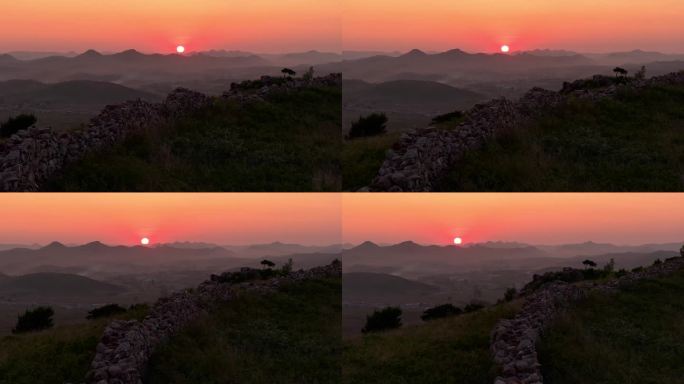 航拍辽宁葫芦岛植股山长城夕阳