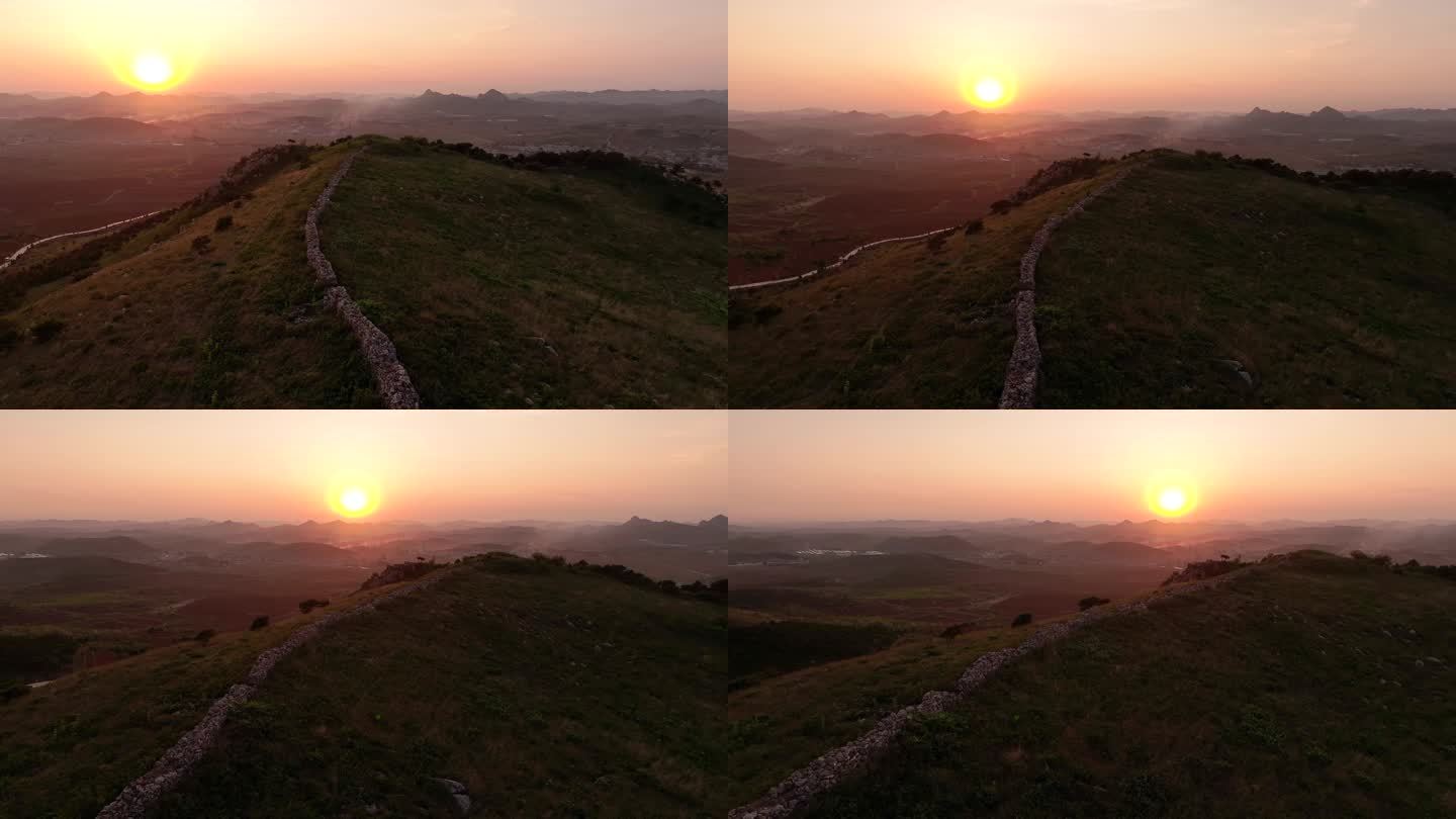 航拍辽宁葫芦岛植股山长城夕阳