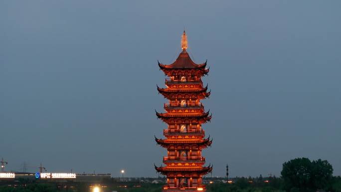 航拍江南水乡古镇乌镇夜景白莲塔风光