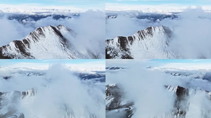 美丽夹金山航拍云雾缭绕的雪山风景